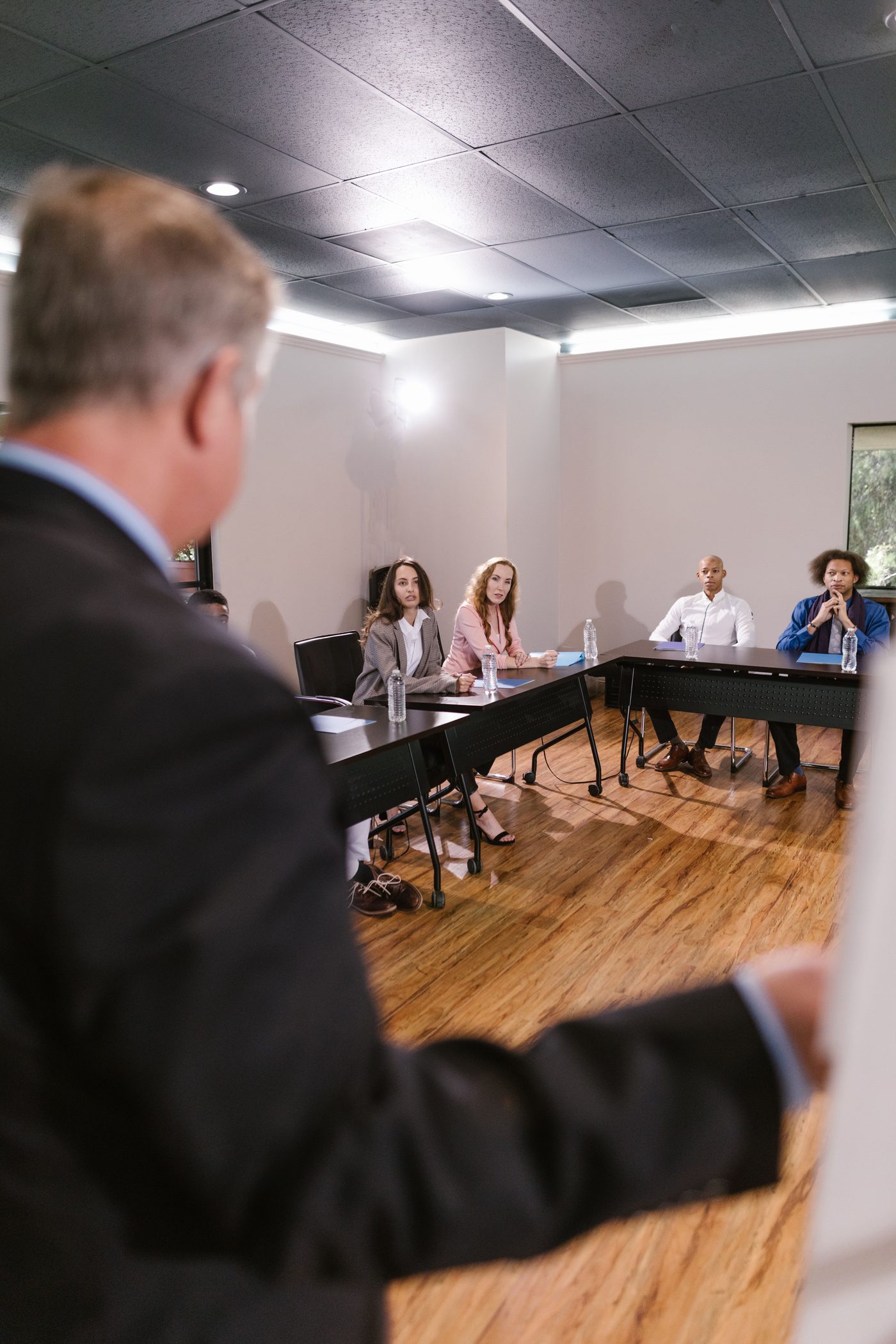 Buck leading a sit-down training session with a dealership team